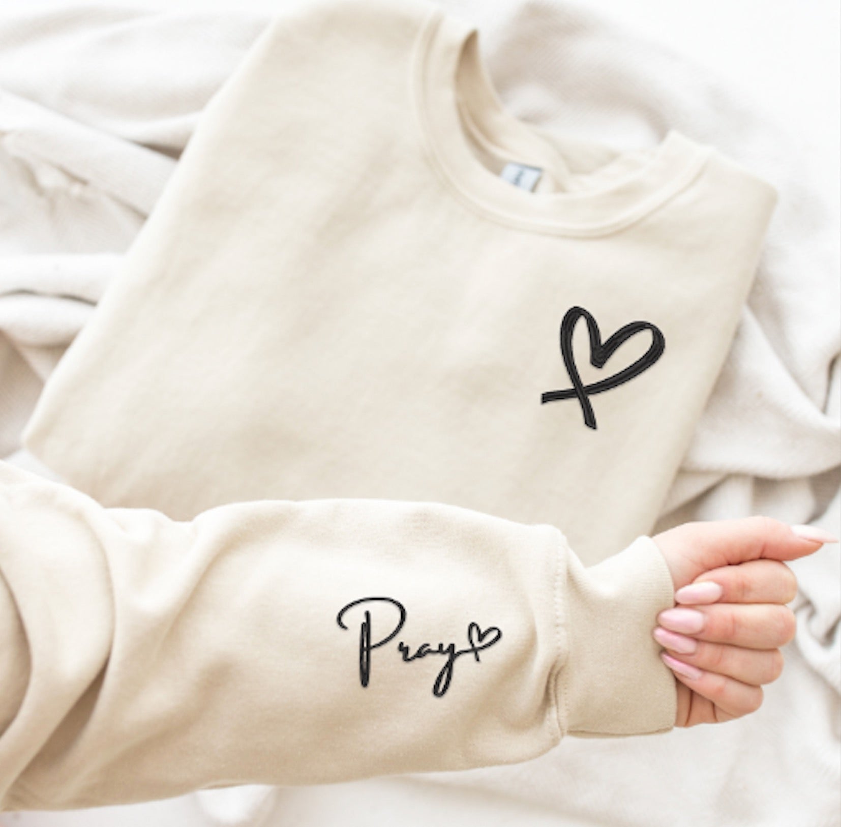 Embroidered pray with heart